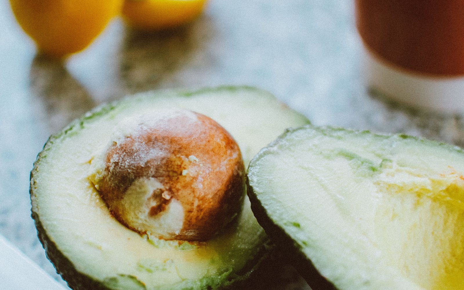 Cut avocado with lemon and a kitchen knife before browning