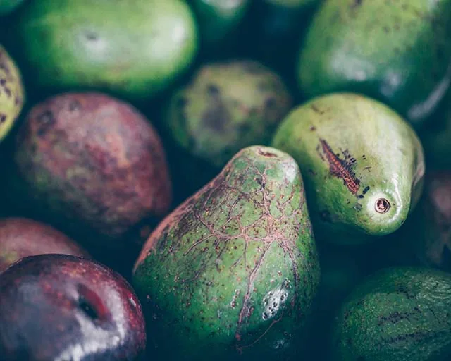 Close-up of whole avocados used as a fresh butter alternative