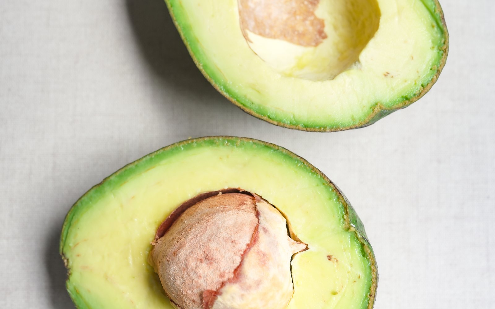 Halved avocado for a heart-health nutrition guide