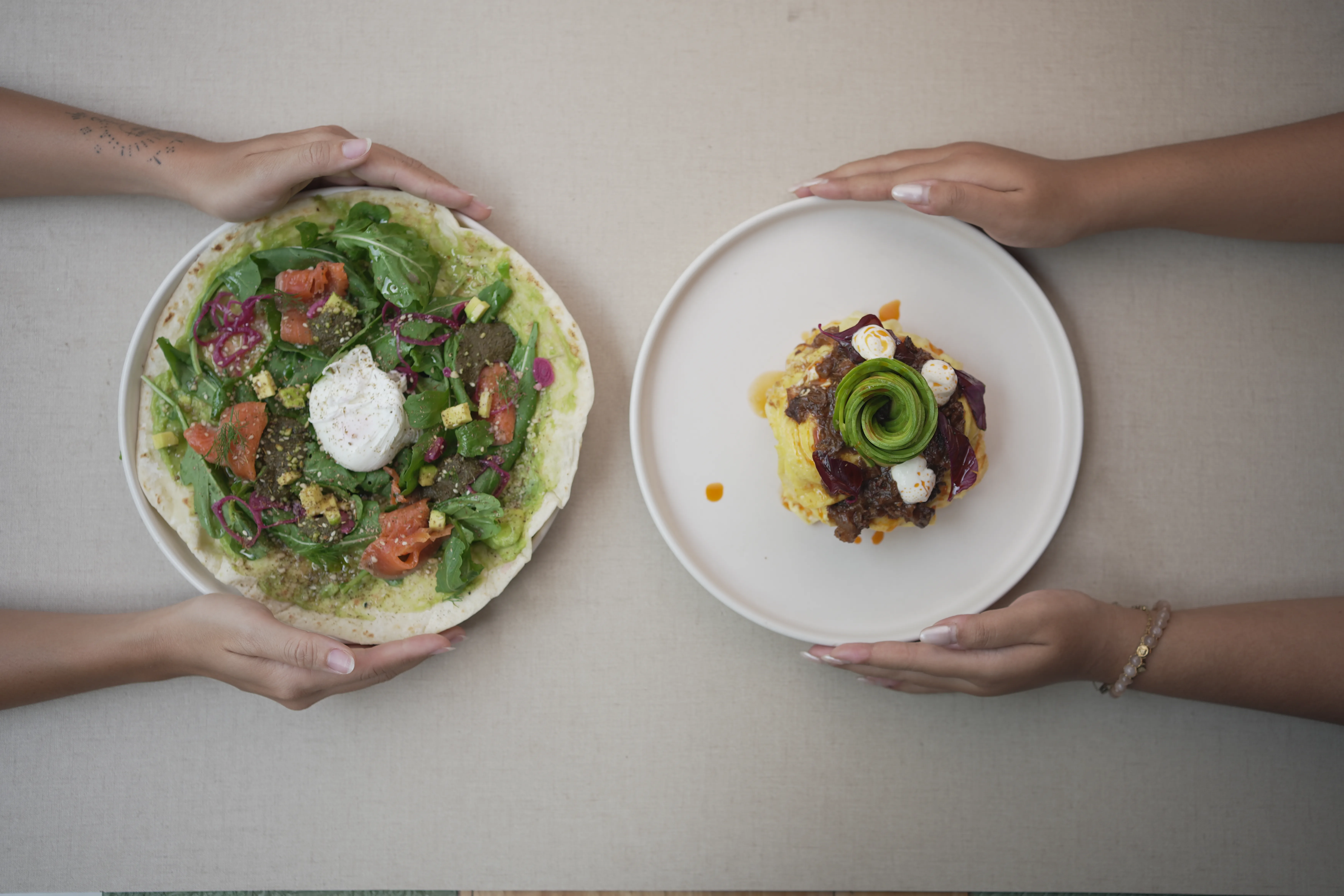 Two avocado-forward dishes served at The Avocado Factory in Canggu
