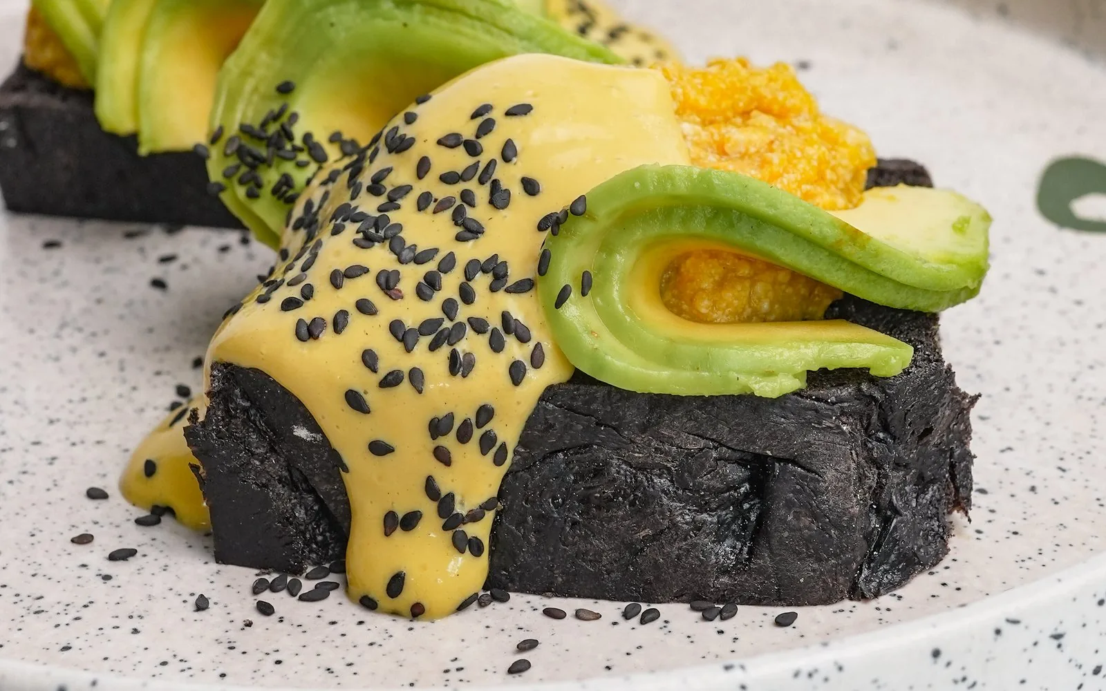 Avocado toast with vegan benedict sauce at The Avocado Factory
