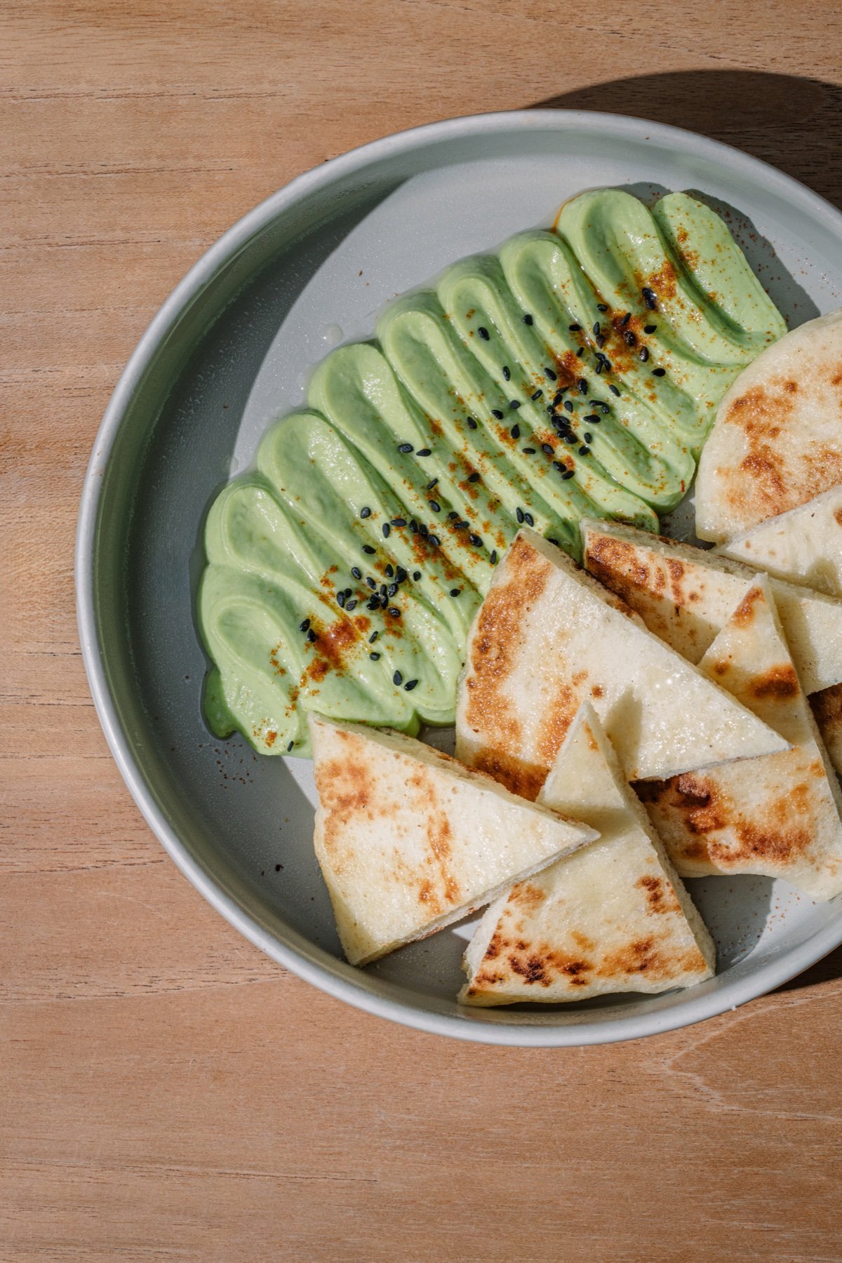 Avocado dip with warm pita at The Avocado Factory