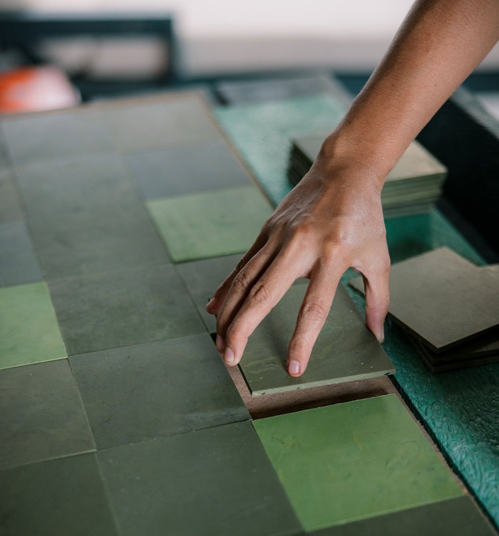 Recycled-plastic green tiles, made by hand